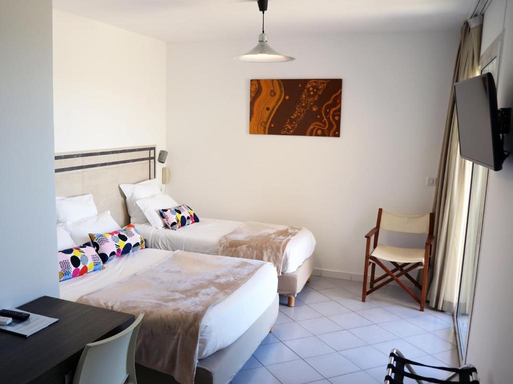 Postel nebo postele na pokoji v ubytování Hotel Stella Di Mare