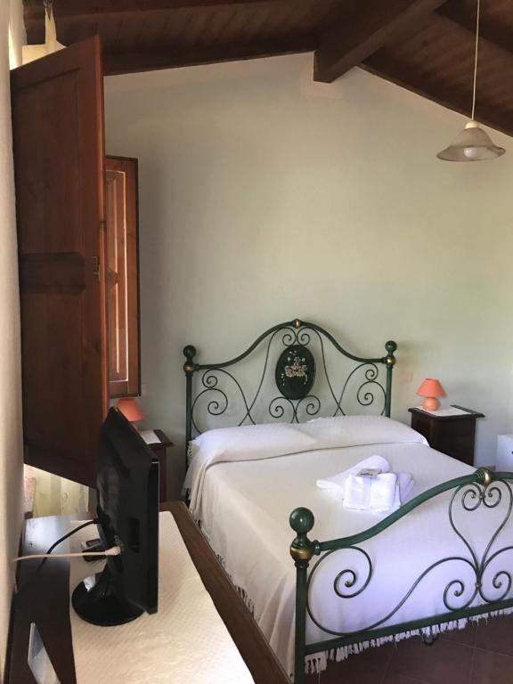 Postel nebo postele na pokoji v ubytování Hotel Belvedere