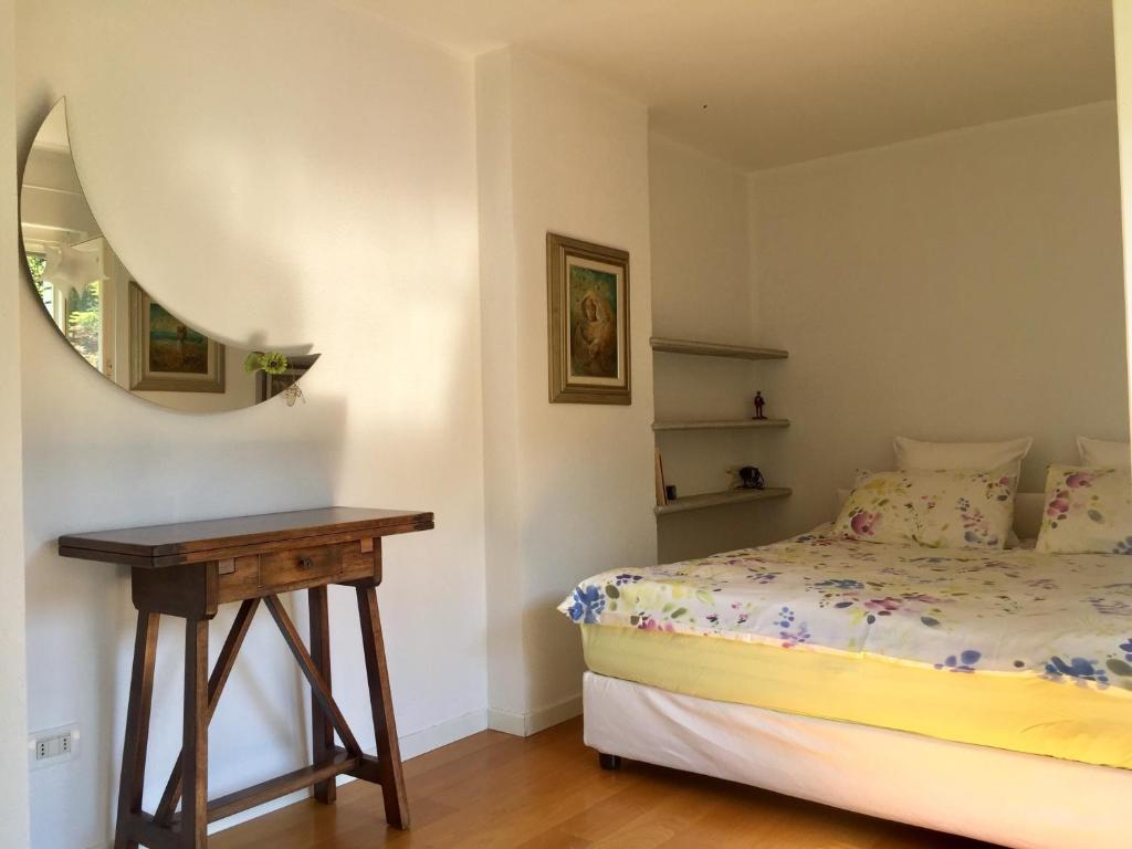 Łóżko lub łóżka w pokoju w obiekcie Villa Alice