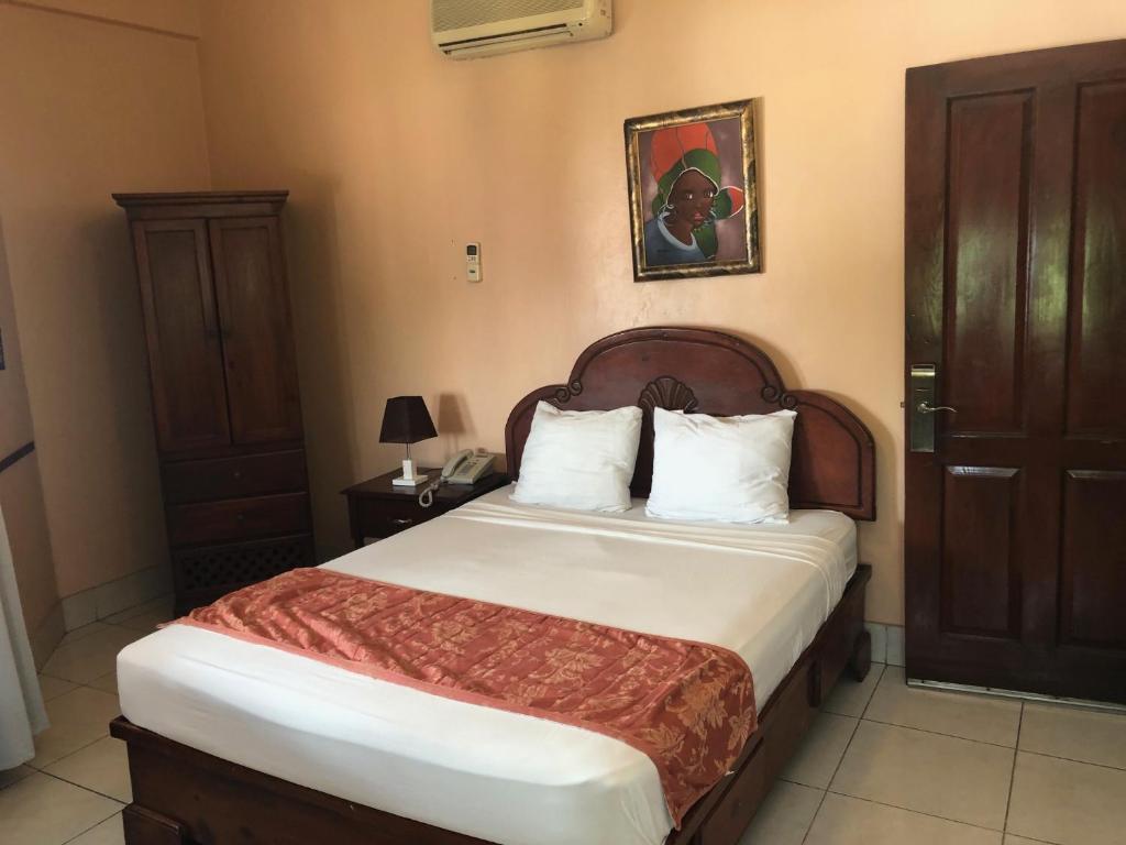 Postel nebo postele na pokoji v ubytování Hotel Discovery