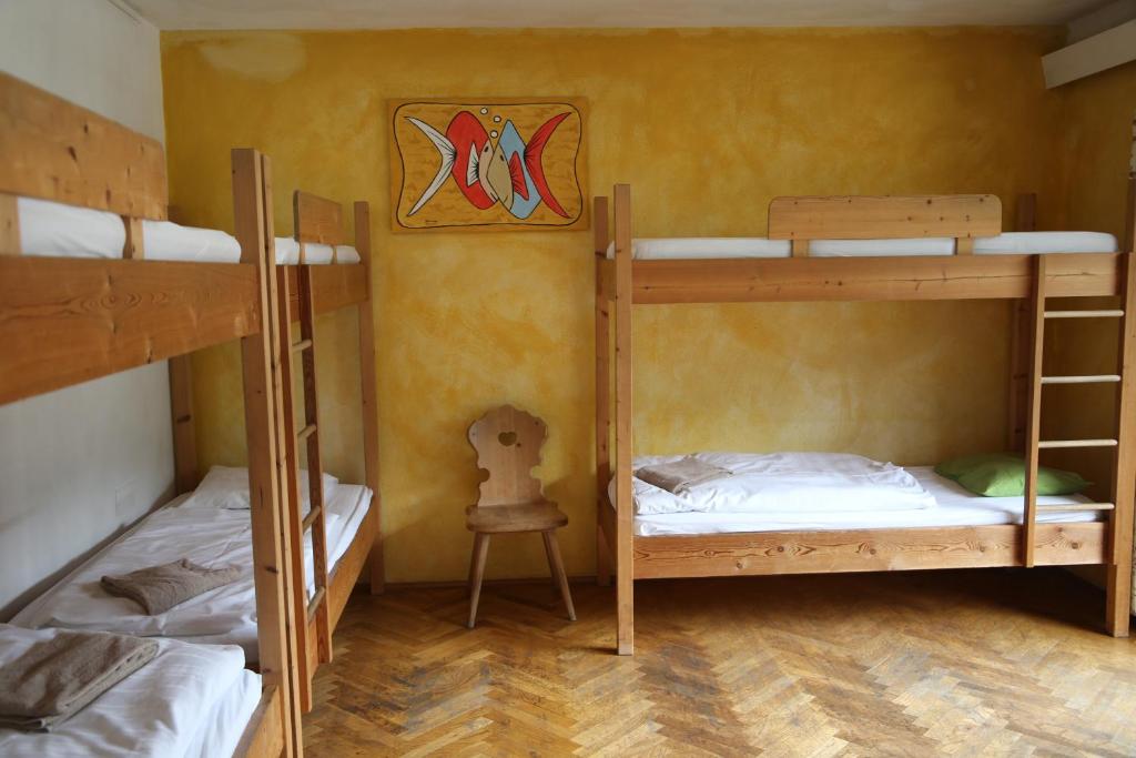 Postel nebo postele na pokoji v ubytování Hotel Schwarzer Adler Sillian