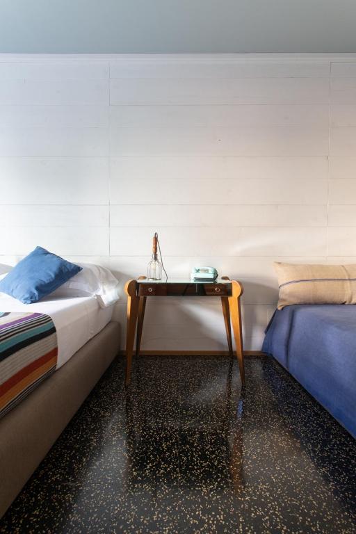 Letto o letti in una camera di Hotel Blu di Te
