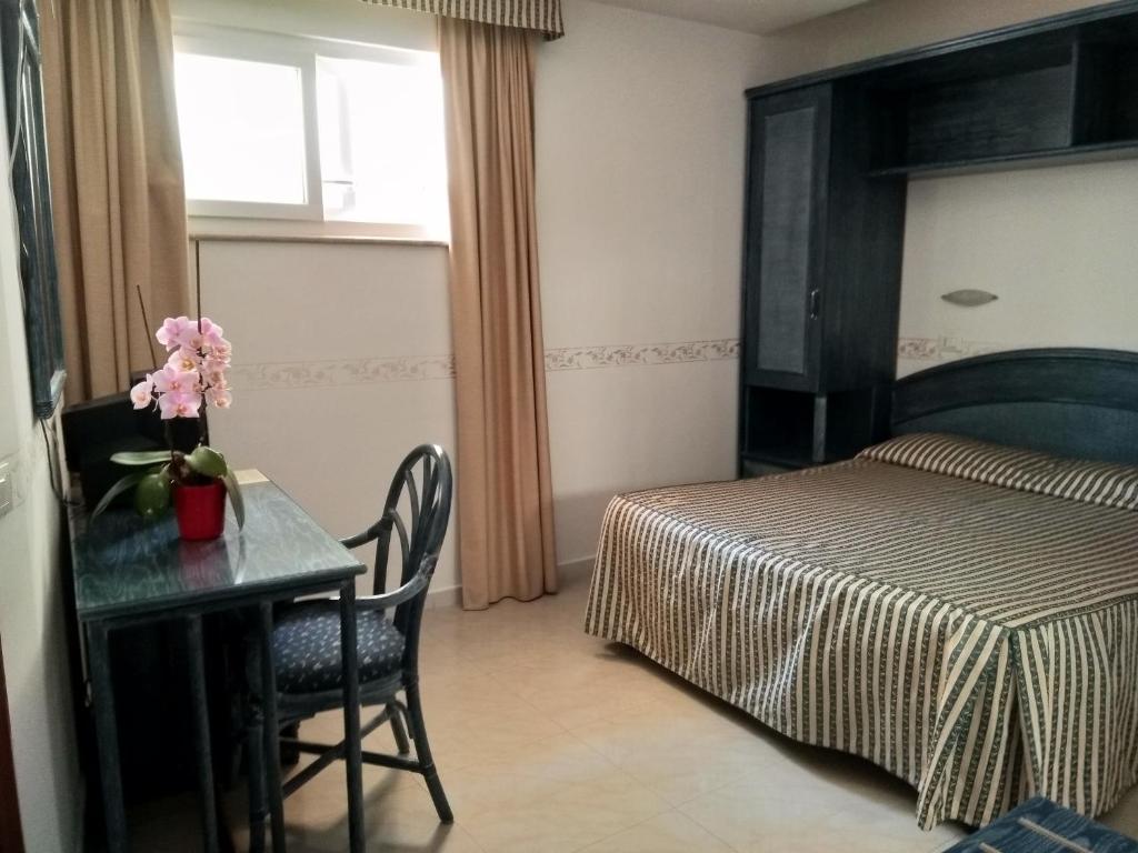 Postel nebo postele na pokoji v ubytování Casthotels Tramonto d'oro Terme
