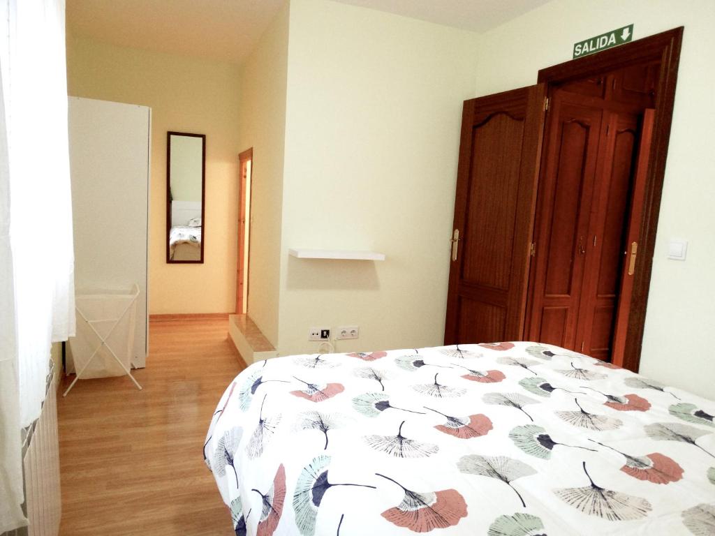 Postel nebo postele na pokoji v ubytování Apartamento del Rosario
