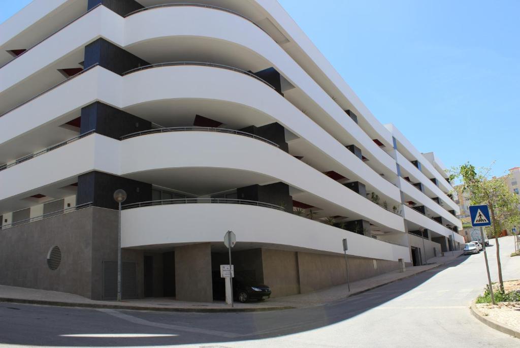 an angled view of a building on a street at Casa Feliz Lagos in Lagos