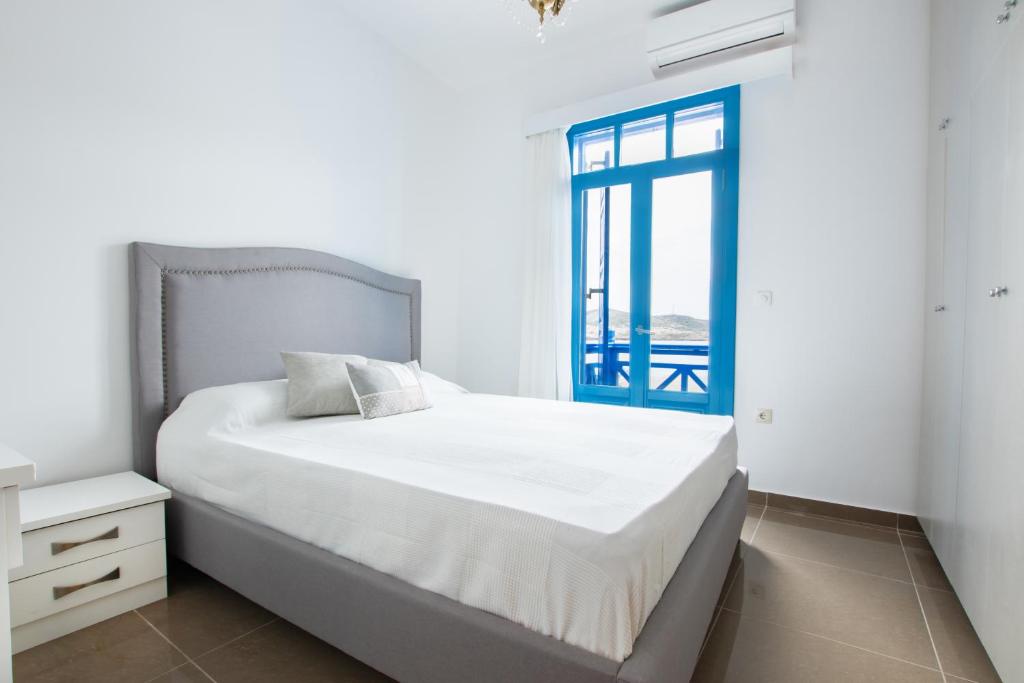 Postel nebo postele na pokoji v ubytování Poseidon Luxury Apartment