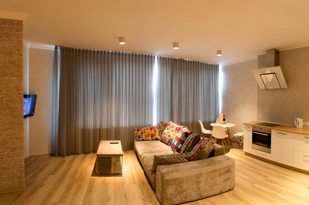 Khu vực ghế ngồi tại Apartments On Henuezskaya 5