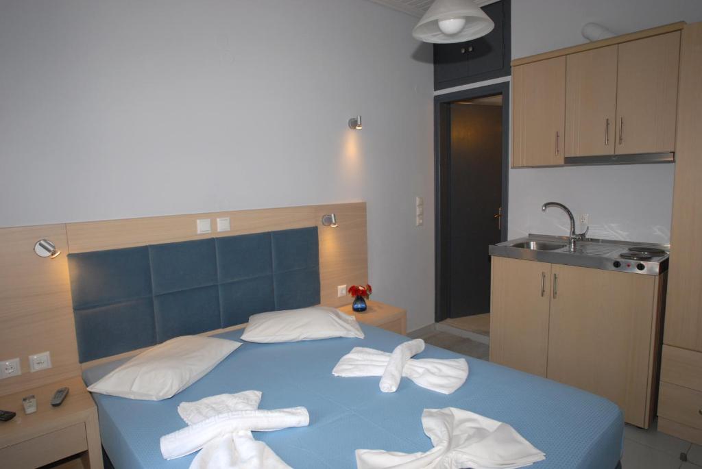 Letto o letti in una camera di Irene ROOMS & STUDIOS PETRA