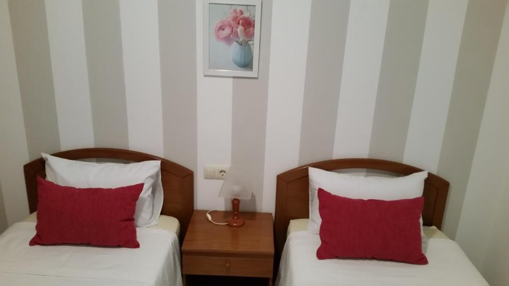 Posteľ alebo postele v izbe v ubytovaní Apartamentos Timón Puerto