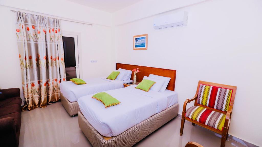 Postel nebo postele na pokoji v ubytování Florida Hotel North Coast
