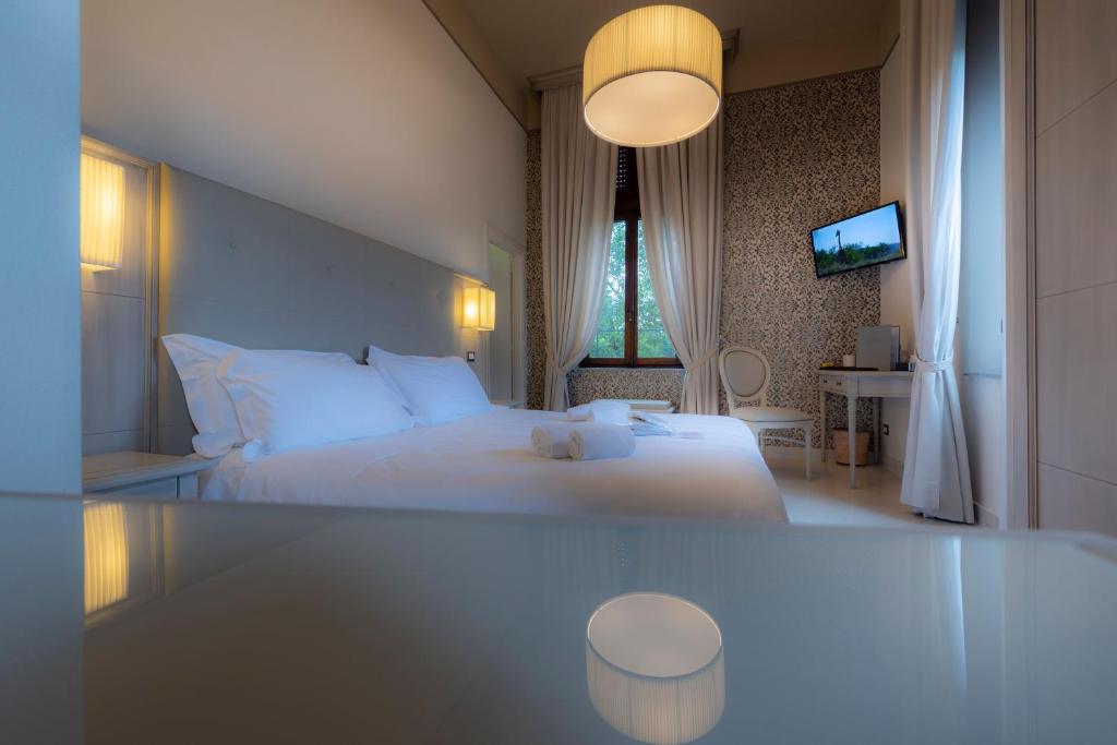 Posteľ alebo postele v izbe v ubytovaní Villa Elda Boutique Hotel