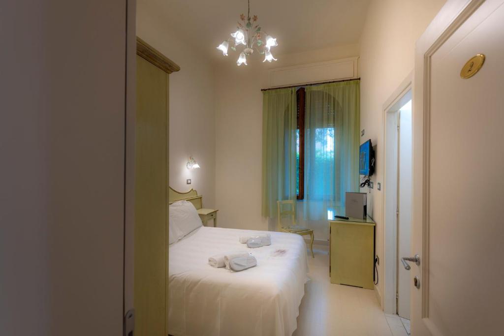 Posteľ alebo postele v izbe v ubytovaní Villa Elda Boutique Hotel