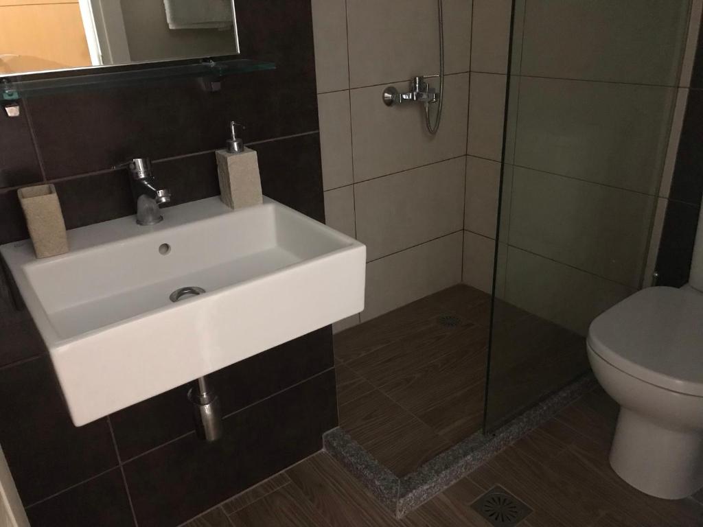 Koupelna v ubytování VIAL Rooms