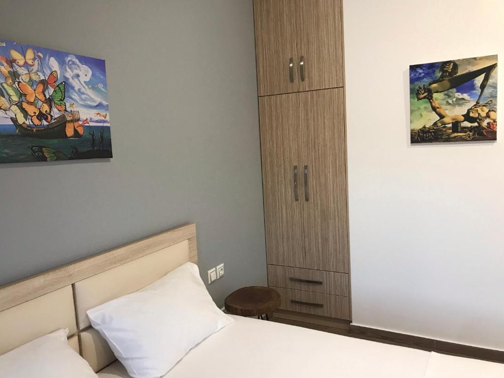 Postel nebo postele na pokoji v ubytování VIAL Rooms