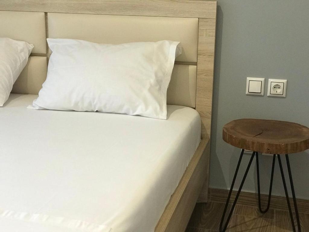Postel nebo postele na pokoji v ubytování VIAL Rooms