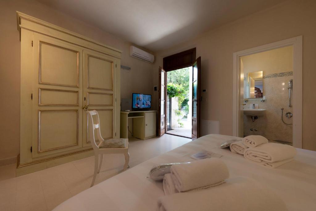 Posteľ alebo postele v izbe v ubytovaní Villa Elda Boutique Hotel