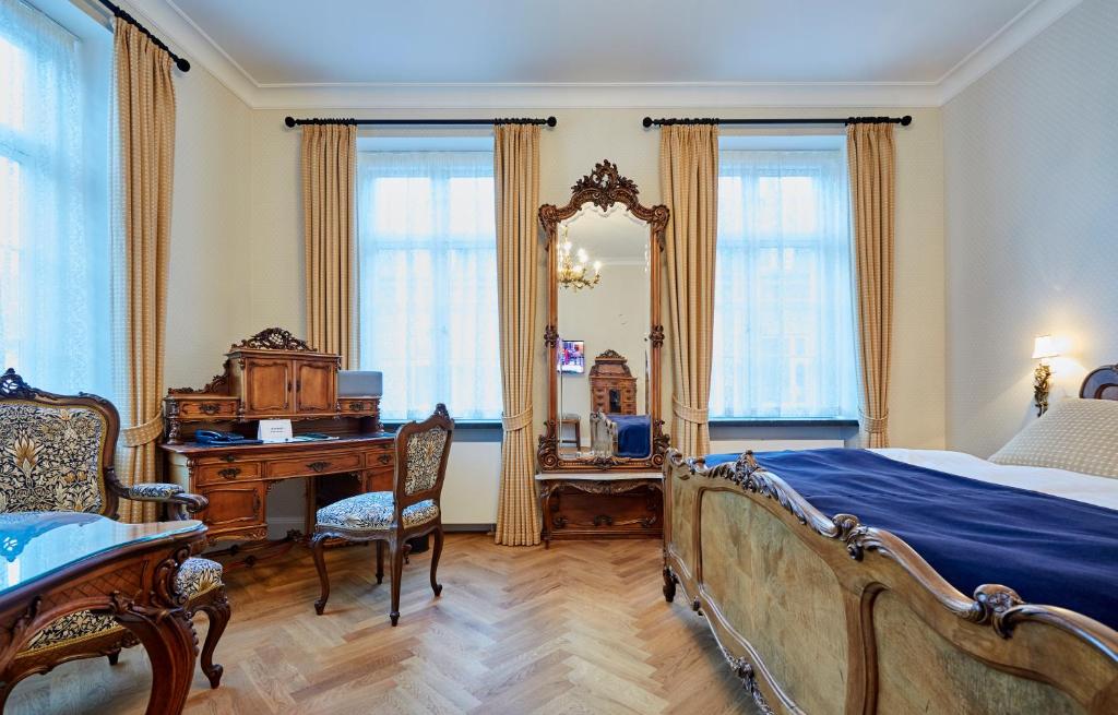 Ένα ή περισσότερα κρεβάτια σε δωμάτιο στο Hotel Randers