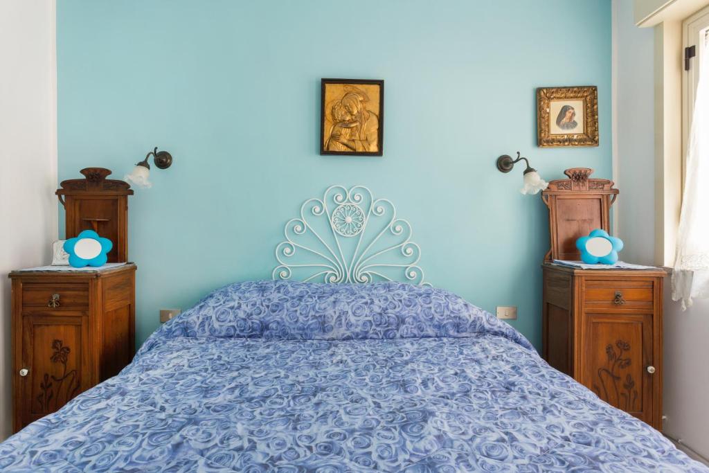 Posteľ alebo postele v izbe v ubytovaní Splendida Casa A Taormina " Casa di Anna "