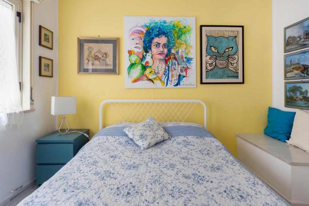 Posteľ alebo postele v izbe v ubytovaní Splendida Casa A Taormina " Casa di Anna "