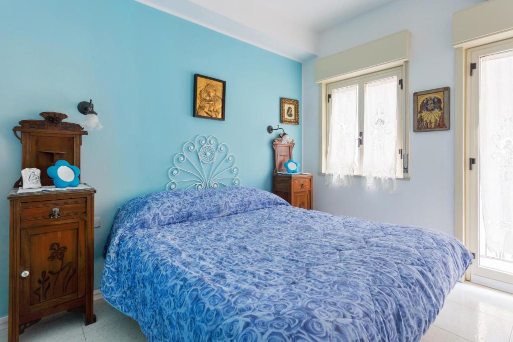 Posteľ alebo postele v izbe v ubytovaní Splendida Casa A Taormina " Casa di Anna "