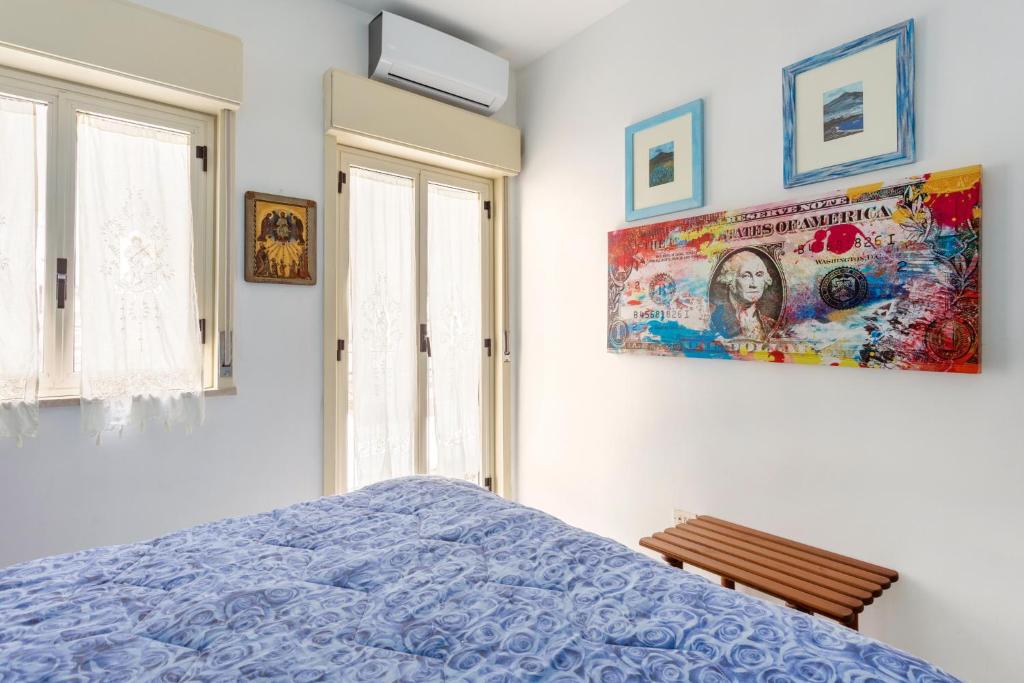Posteľ alebo postele v izbe v ubytovaní Splendida Casa A Taormina " Casa di Anna "