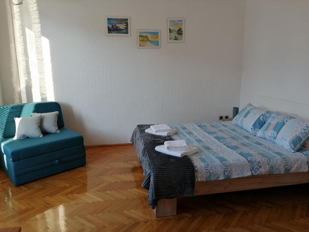 Postel nebo postele na pokoji v ubytování Apartman studio Katarina