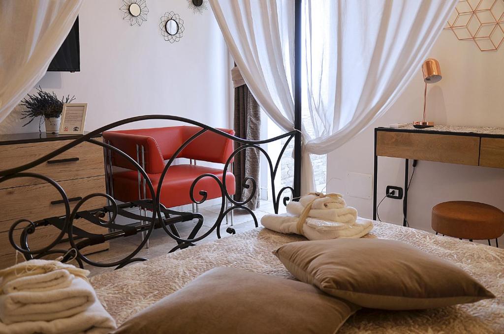 Postel nebo postele na pokoji v ubytování CASA FELICE Maison de Charme
