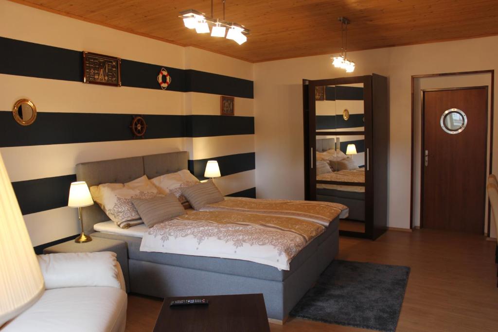 Postel nebo postele na pokoji v ubytování Penzion Nautica