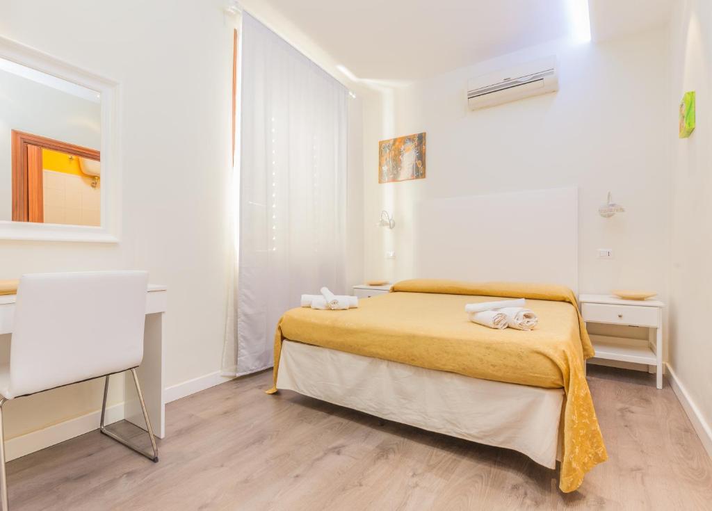Postel nebo postele na pokoji v ubytování Albergo Della Corte
