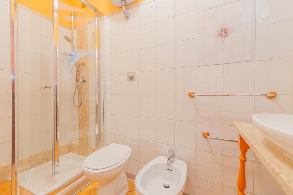 Koupelna v ubytování Albergo Della Corte