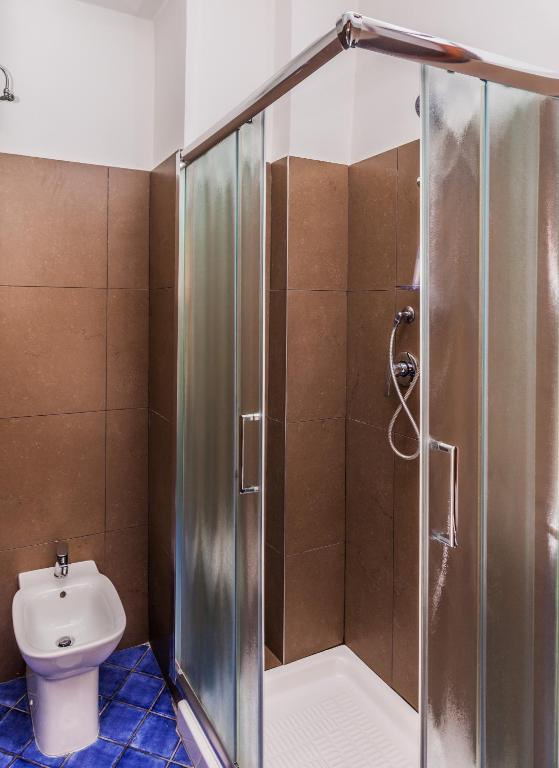 Koupelna v ubytování Albergo Della Corte