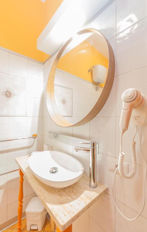 Koupelna v ubytování Albergo Della Corte