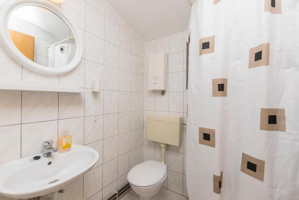 Kúpeľňa v ubytovaní Apartments Miroslava