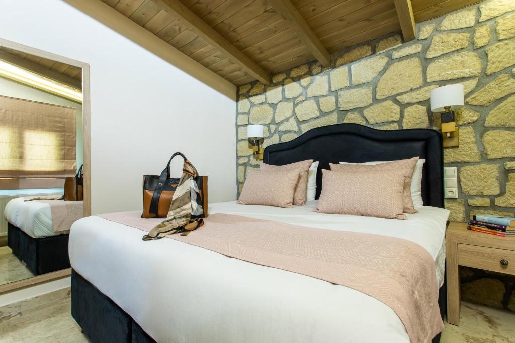 Postel nebo postele na pokoji v ubytování Meteora boutique villa A