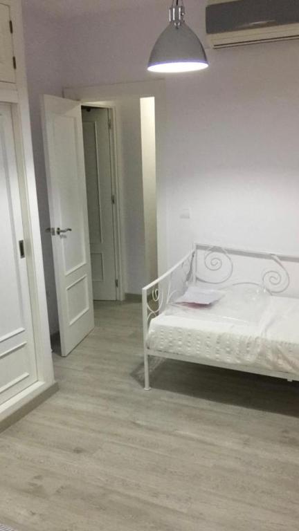 Postel nebo postele na pokoji v ubytování Isla Canela 2 dormitorios Paseo de los gavilanes blq1 n 13