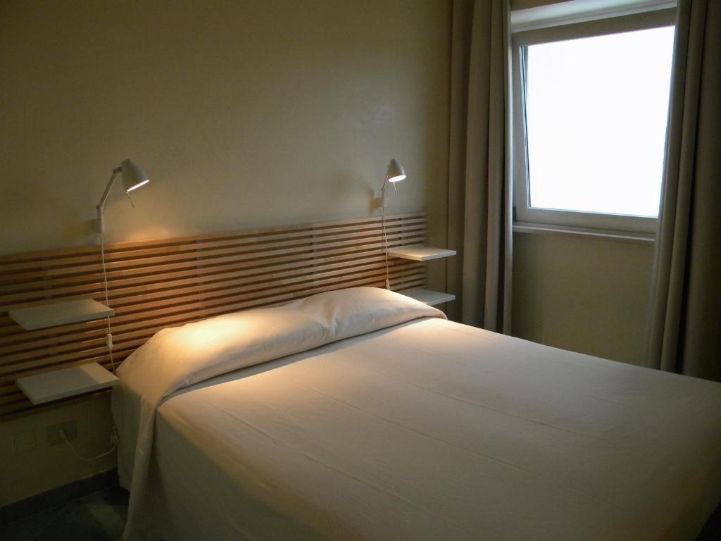 Postel nebo postele na pokoji v ubytování Albergo Villa Anna