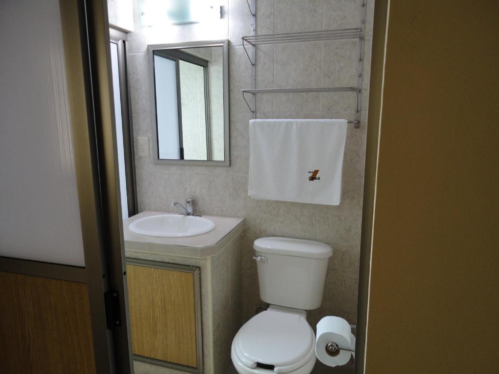Koupelna v ubytování Hotel Catala