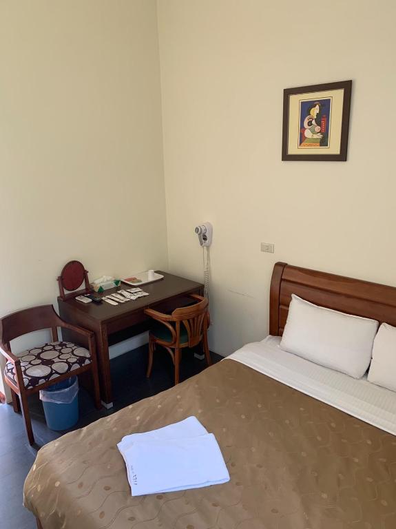 Postel nebo postele na pokoji v ubytování Taomi 5211 B&B
