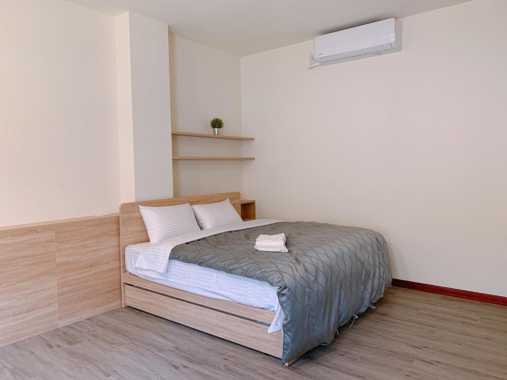Postel nebo postele na pokoji v ubytování Taomi 5211 B&B