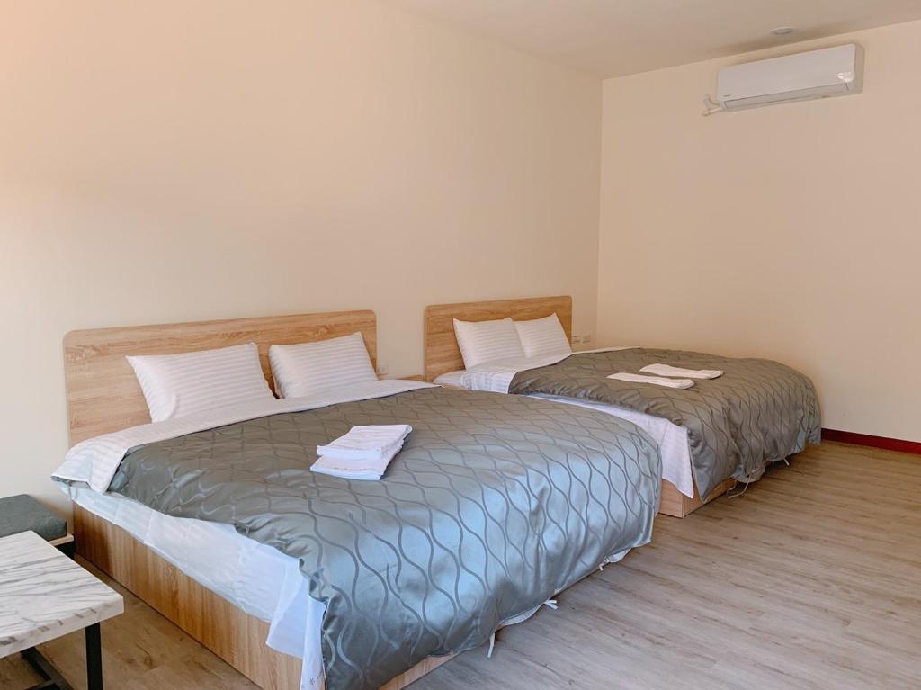 Postel nebo postele na pokoji v ubytování Taomi 5211 B&B