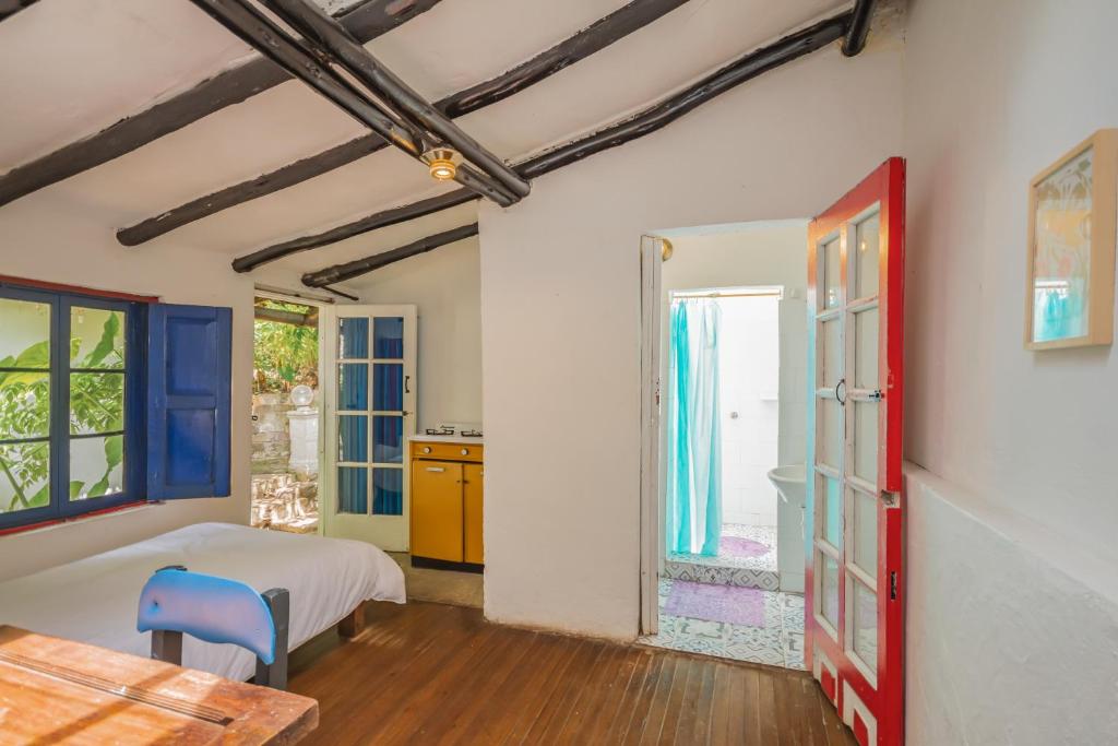 Postel nebo postele na pokoji v ubytování Botanico Hostel