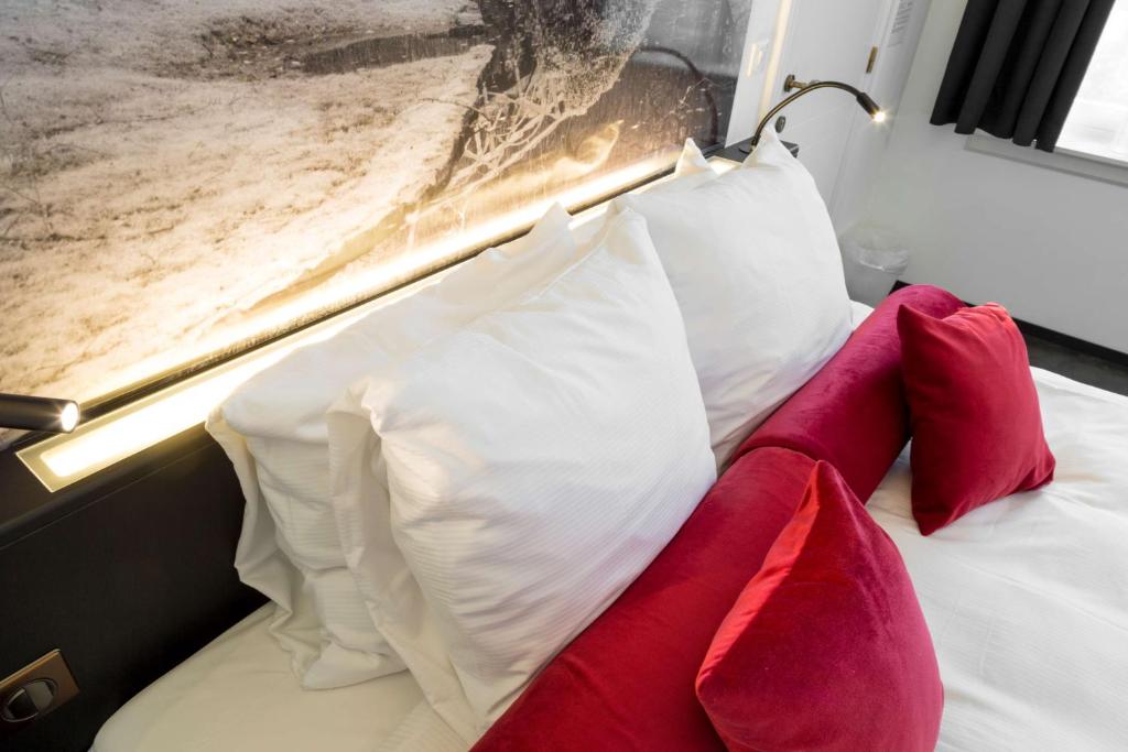 Postel nebo postele na pokoji v ubytování Zimmerhof Hotel