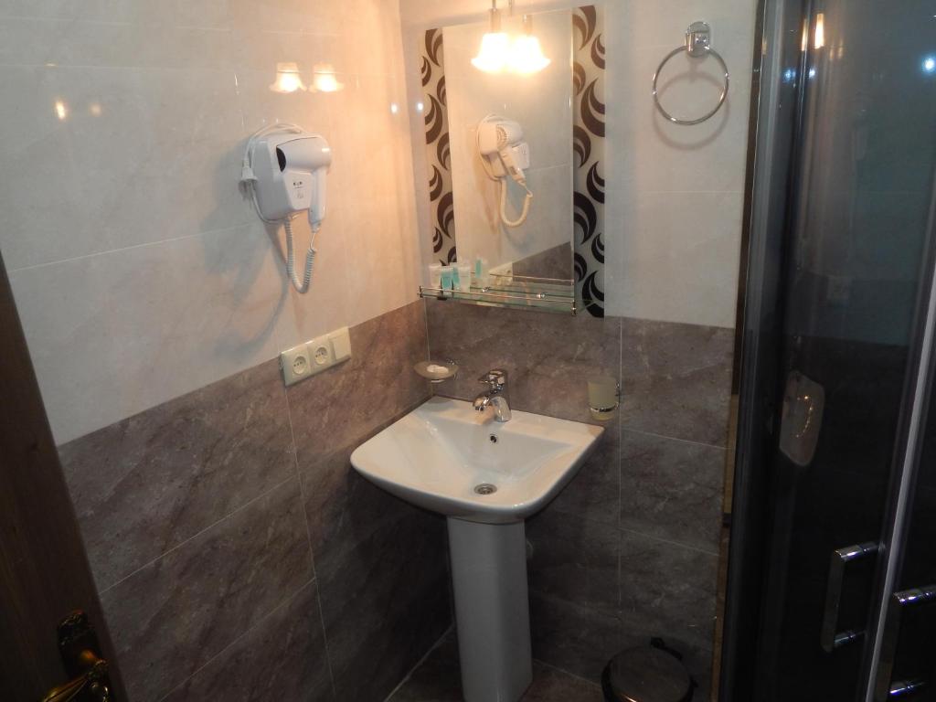 Koupelna v ubytování Hotel Belugo