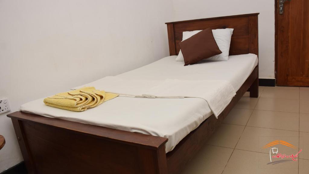 Postel nebo postele na pokoji v ubytování Gamagedara Resort