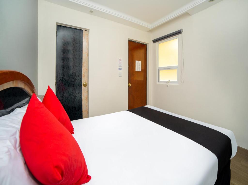Postel nebo postele na pokoji v ubytování Hotel Monarca