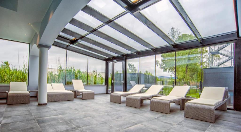 Posezení v ubytování SPA Boutique Appartement # 26 with Indoor- and Outdoorpool