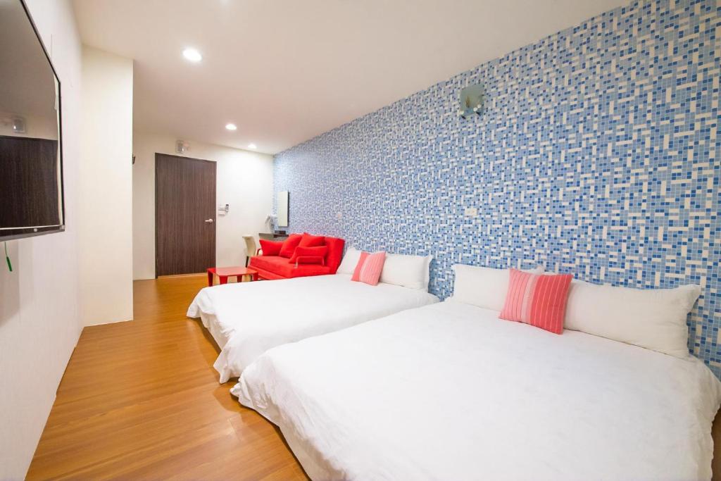 Postel nebo postele na pokoji v ubytování Luodong Nightmarket Homestay