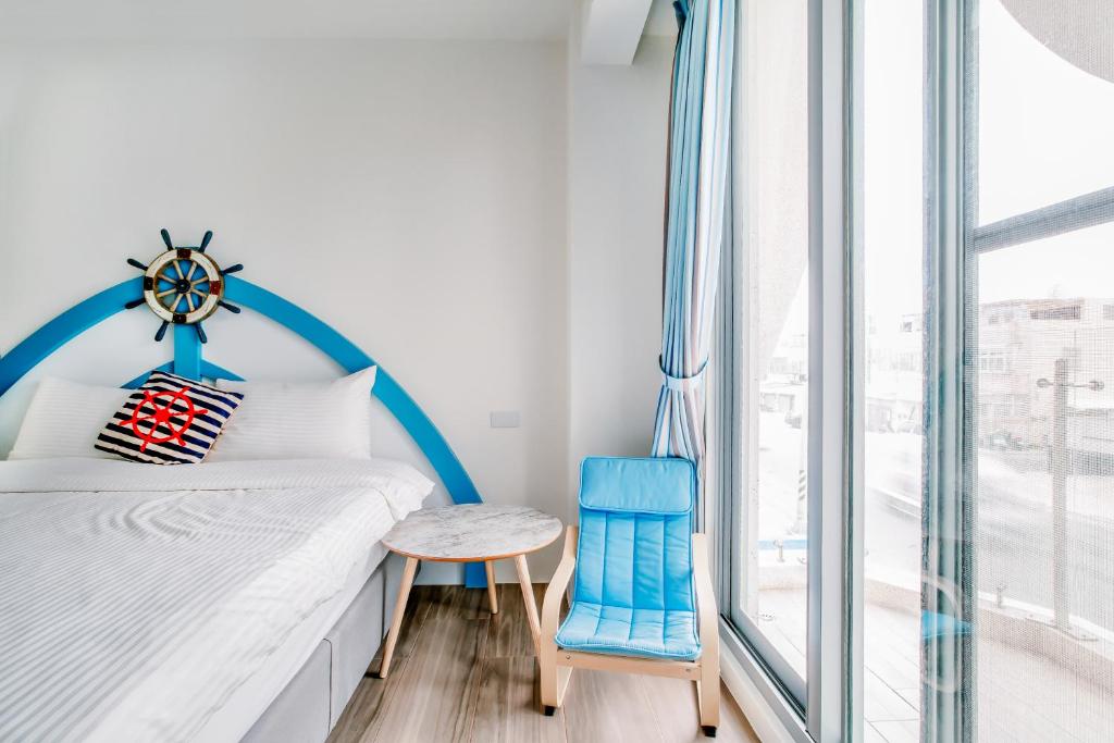 Postel nebo postele na pokoji v ubytování Party of the Ocean B&B