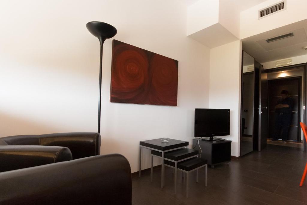 Telewizja i/lub zestaw kina domowego w obiekcie Della Piana Residence