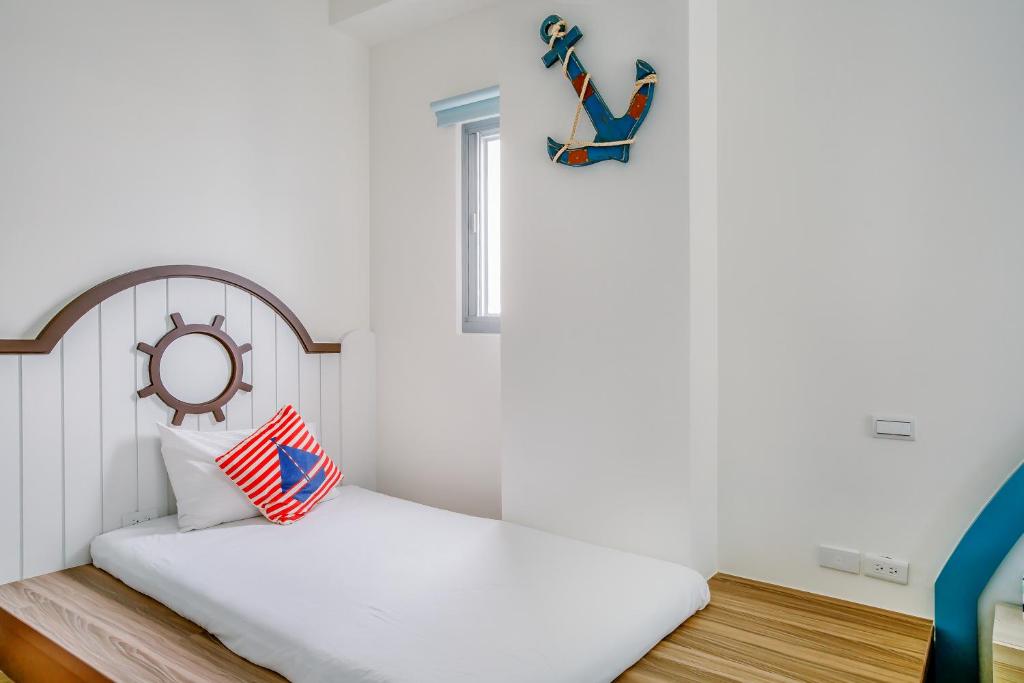 Postel nebo postele na pokoji v ubytování Party of the Ocean B&B